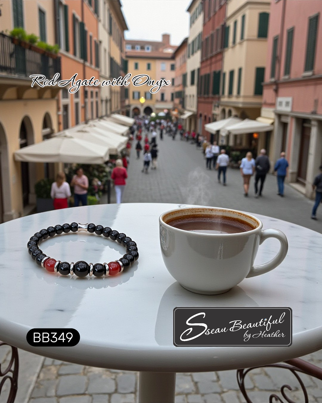 Cup of coffee and bracelet on a table with a blurred street scene in the background