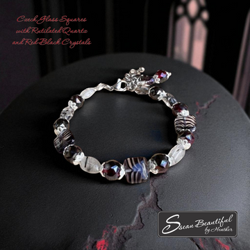 Adjustable bracelet featuring Czech Glass, Rutilated Quartz, and Red-Black Crystals