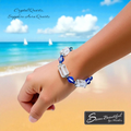 Adjustable bracelet with Crystal Quartz tubes and Sapphire Aura Quartz rounds