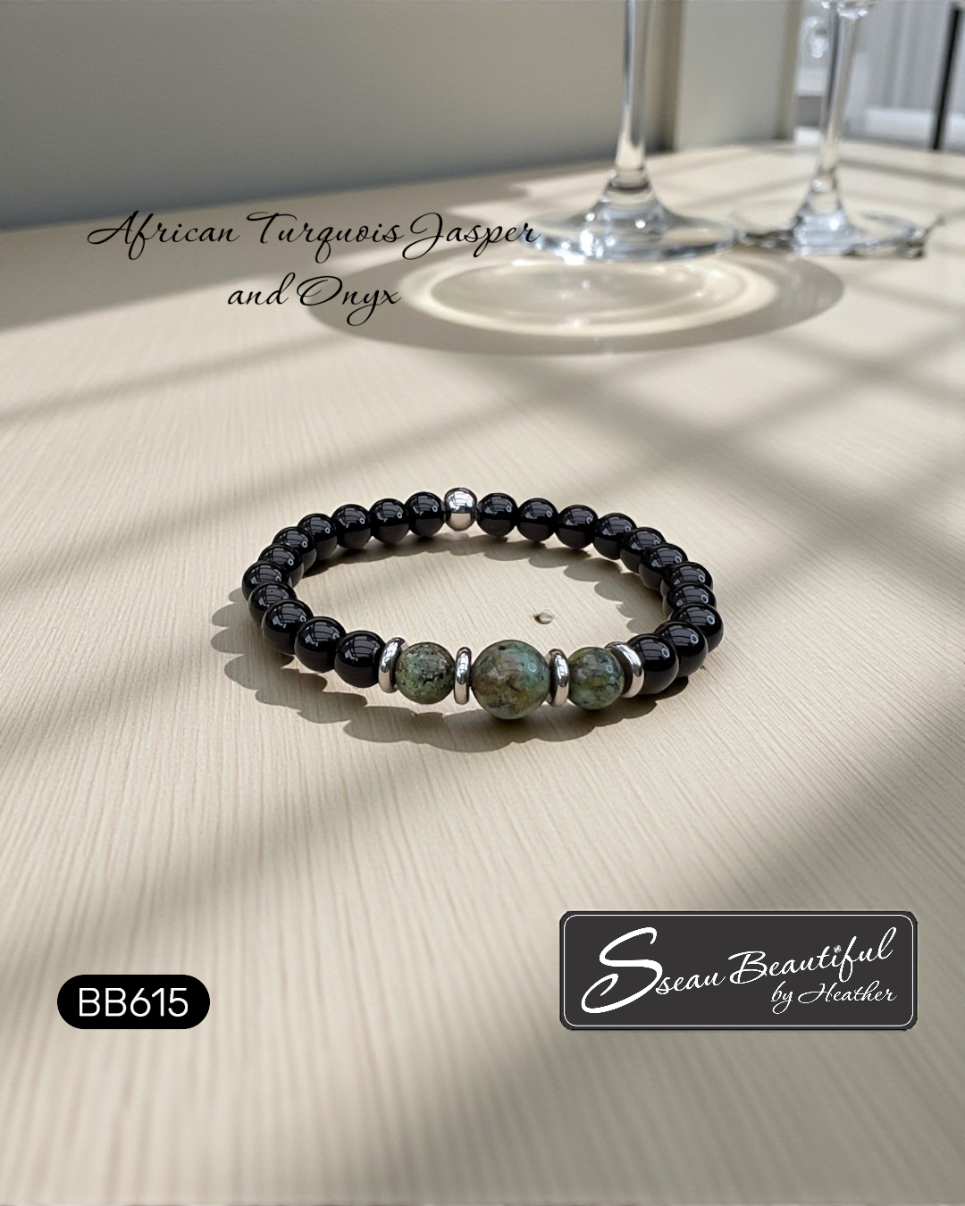 Men's 7.25 inch black onyx and African turquoise jasper beaded stretch bracelet with stainless steel accents, Model BB615, with Sseau Beautiful logo