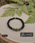 Men's 7.25 inch black onyx and African turquoise jasper beaded stretch bracelet with stainless steel accents, Model BB615, with Sseau Beautiful logo