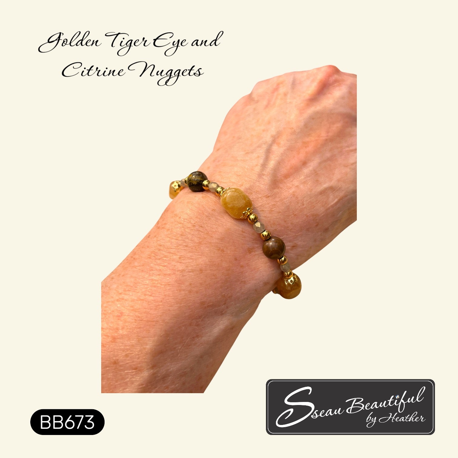 A beaded bracelet featuring golden tiger eye and citrine stones with small gold-tone stainless steel spacer beads, shown worn on a person's wrist. The image includes text reading 'Golden Tiger Eye and Citrine Nuggets' and the brand logo 'Sseau Beautiful by Heather'.