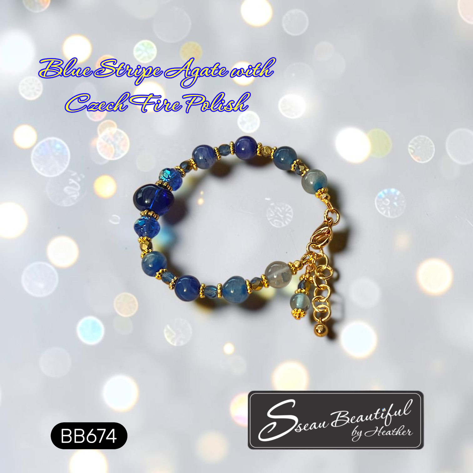 A beaded bracelet made of blue striped agate beads with Czech fire polish, accented with gold spacer beads and a gold clasp with a dangling charm, shown against a sparkling bokeh background with text overlays.