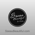 A bracelet made from Yellow and Grey Aura Quartz on a turning stand with the Sseau Beautiful logo and website at the end