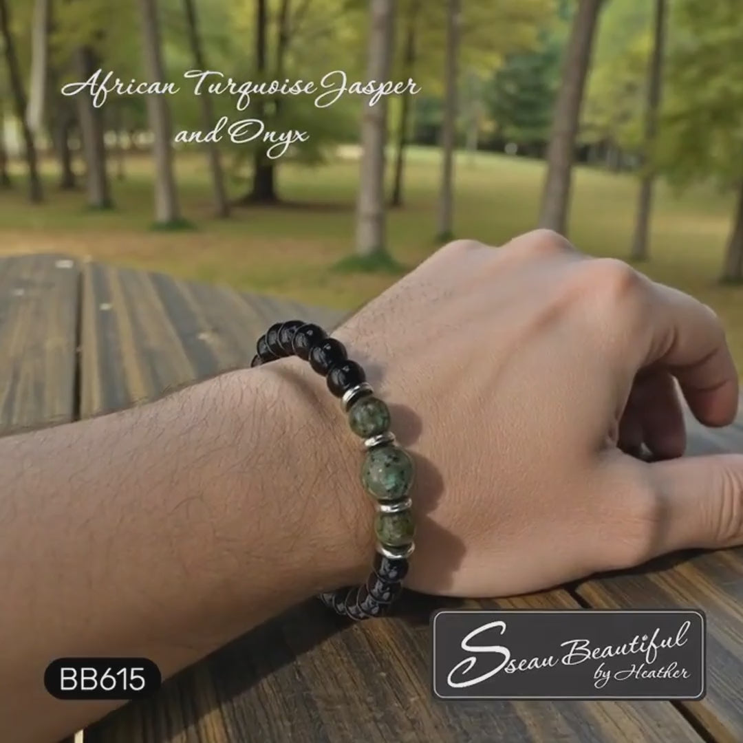 Video showcasing a men's black onyx and African turquoise stretch bracelet on a wrist outdoors, transitioning to a rotating display.