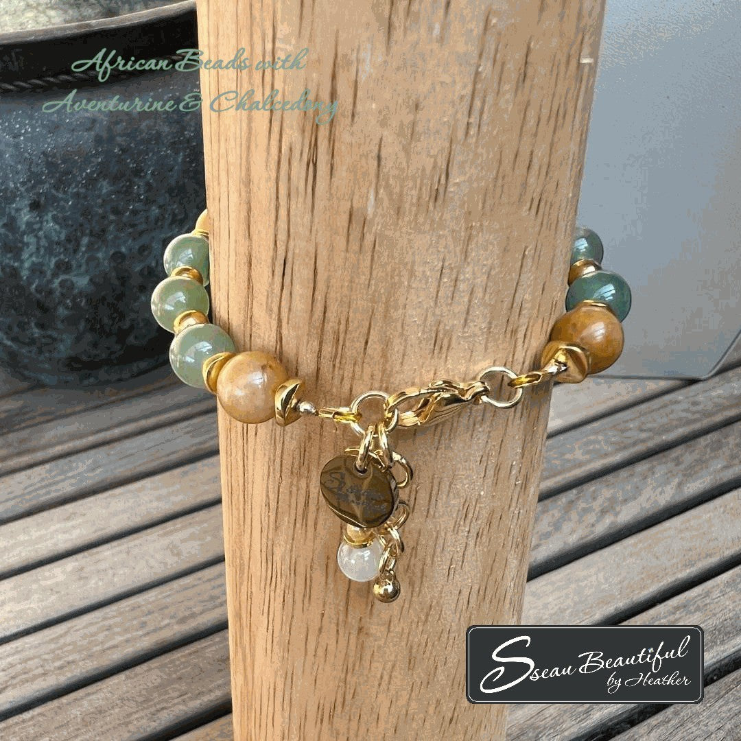 Sseau Beautiful adjustable bracelet with green aventurine, brown chalcedony, and African beads, featuring gold-tone charms.