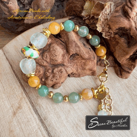 Sseau Beautiful adjustable bracelet with green aventurine, yellow chalcedony, and African beads on a wooden surface.