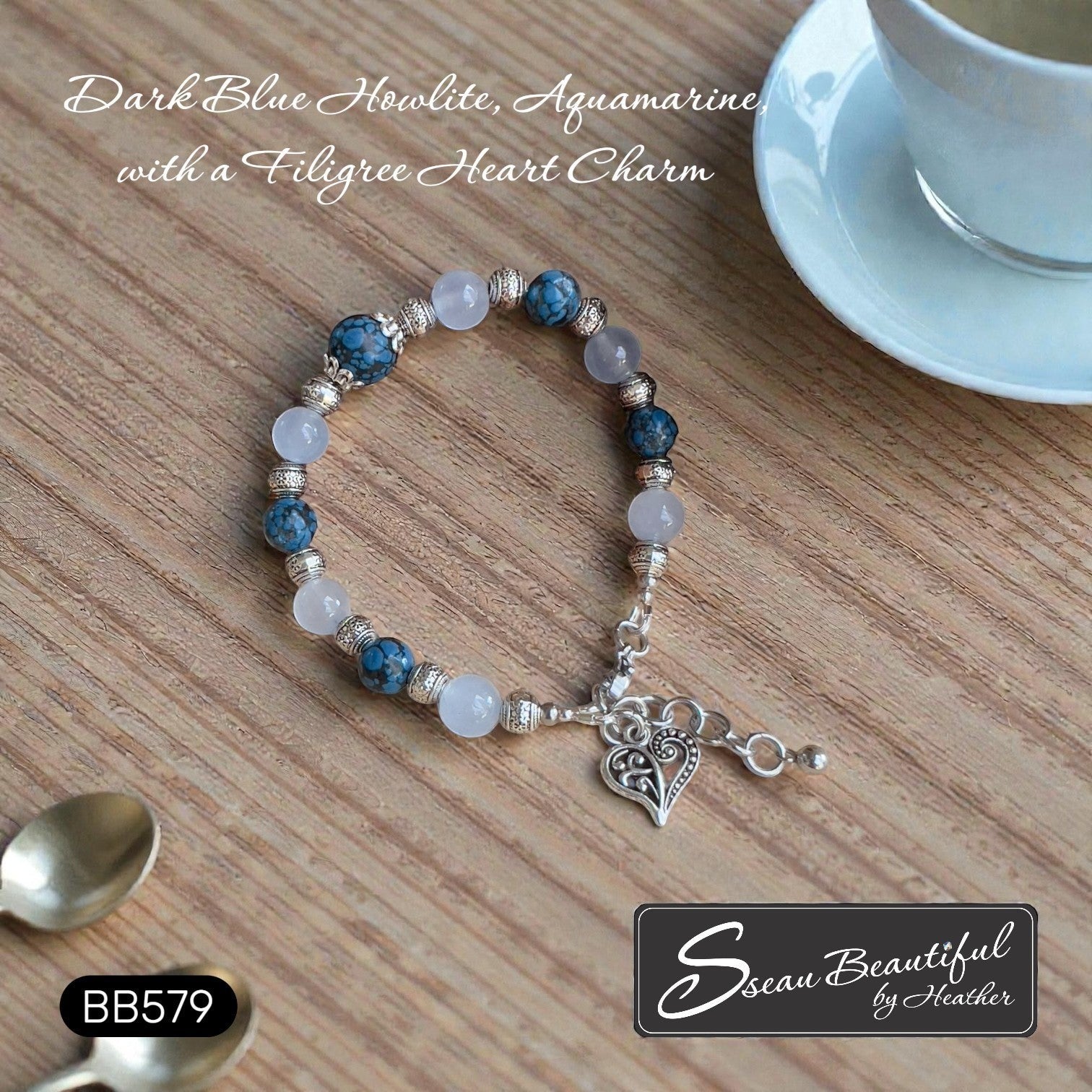 Sseau Beautiful! adjustable bracelet with dark blue Howlite, Aquamarine beads and filigree heart charm.