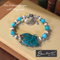 Sseau Beautiful! adjustable bracelet with Sea Sediment Jasper slice, turquoise Magnesite beads, cream Magnesite spacers, and engraved 