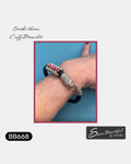 Sseau Beautiful! black leather cuff bracelet with a silver snake head clasp and pink GemDuo beads, 7 inch