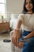 Sseau Beautiful! Strawberry Dream stretch bracelet with rose quartz, strawberry quartz focal, and butterfly charm.