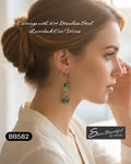 Sseau Beautiful! Tri-Colour Howlite and green crystal dangle earrings with silver-toned bead caps and stainless steel leverbacks.