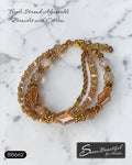 Sseau Beautiful! warm gold triple strand adjustable bracelet with citrine beads and faceted glass accents.
