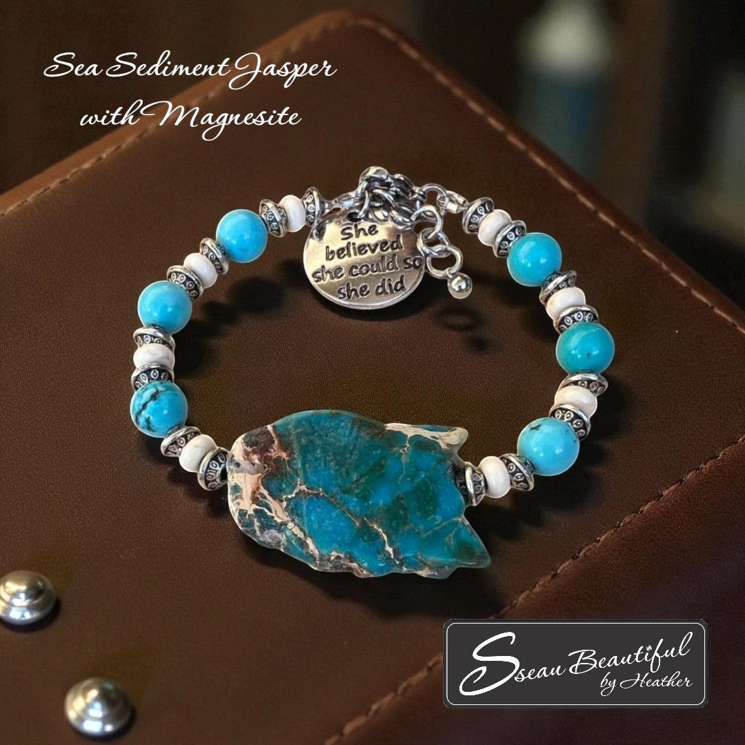 Sseau Beautiful! adjustable bracelet with Sea Sediment Jasper slice, turquoise Magnesite beads, and engraved "She believed she could so she did" charm.