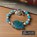 Sseau Beautiful! adjustable bracelet with Sea Sediment Jasper slice, turquoise Magnesite beads, cream Magnesite spacers, and engraved charm.
