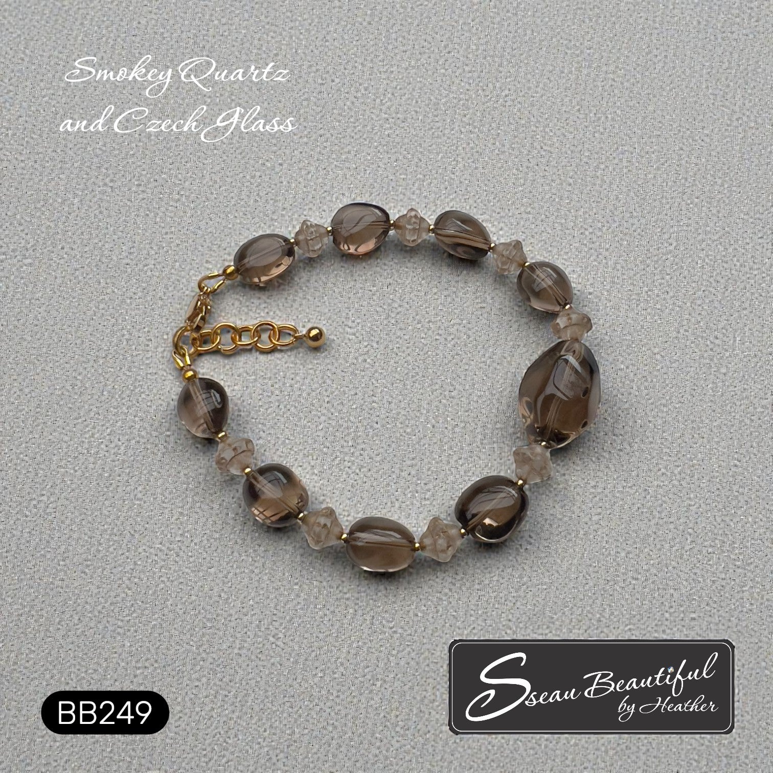 Sseau Beautiful! adjustable bracelet with smokey quartz nuggets and Czech glass, 18k gold-plated spacers, gold-tone clasp.